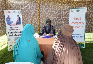 Women accessing services in Safe Spaces at a camp